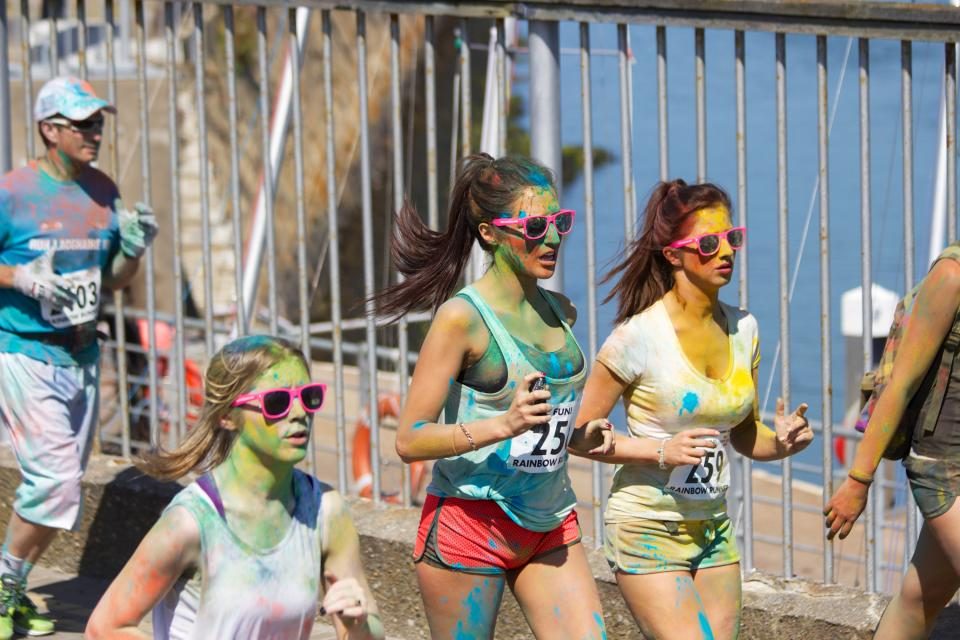 Participants of a charity run with race bibs